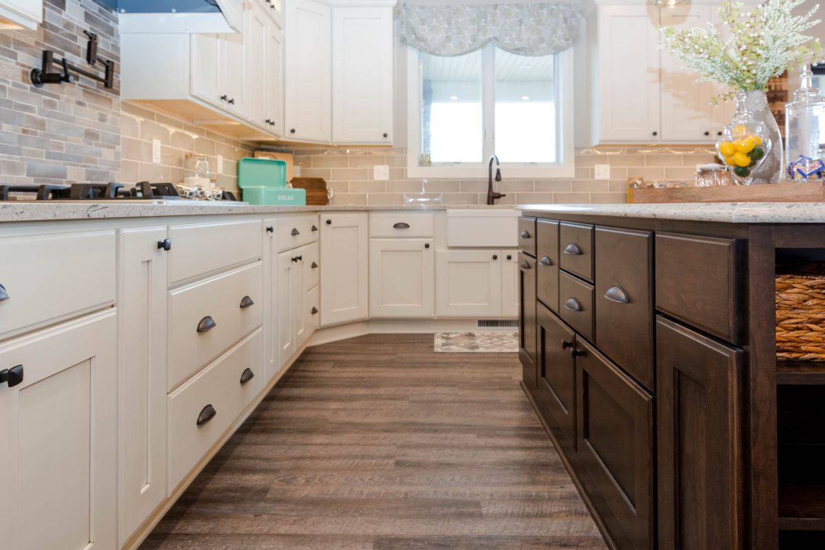 Antique Ivory Finished Kitchen with a Contrasting Island