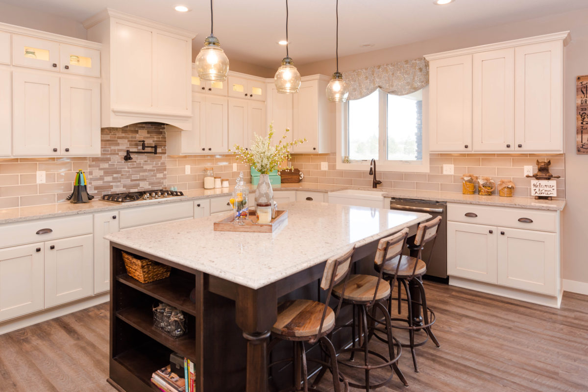 Antique Ivory Finished Kitchen with a Contrasting Island