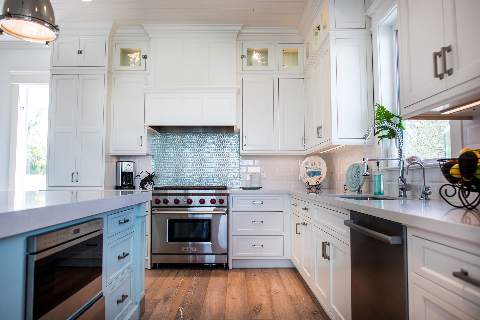 Coastal Style White Kitchen with Blue Island