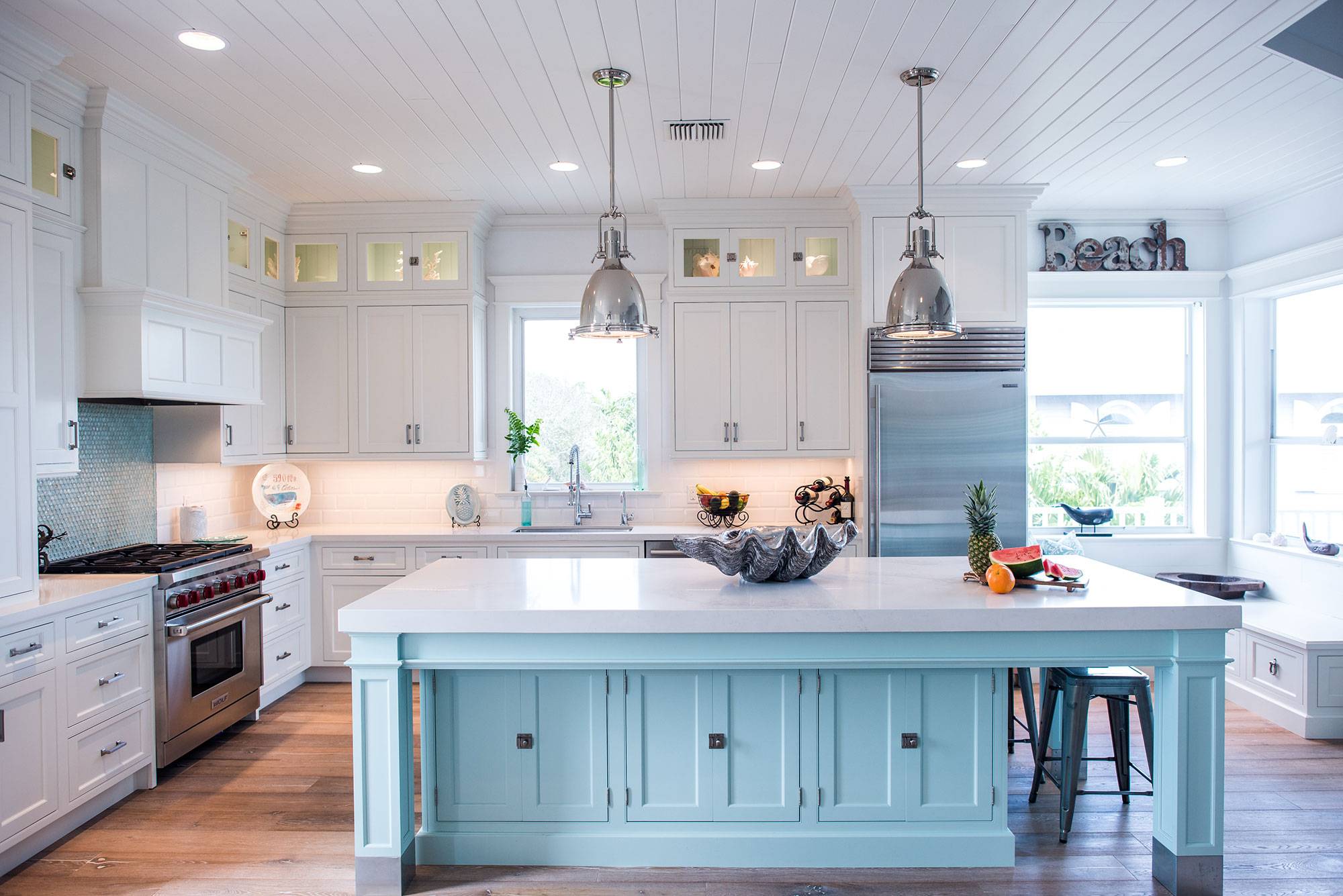 Coastal Style White Kitchen with Blue Island