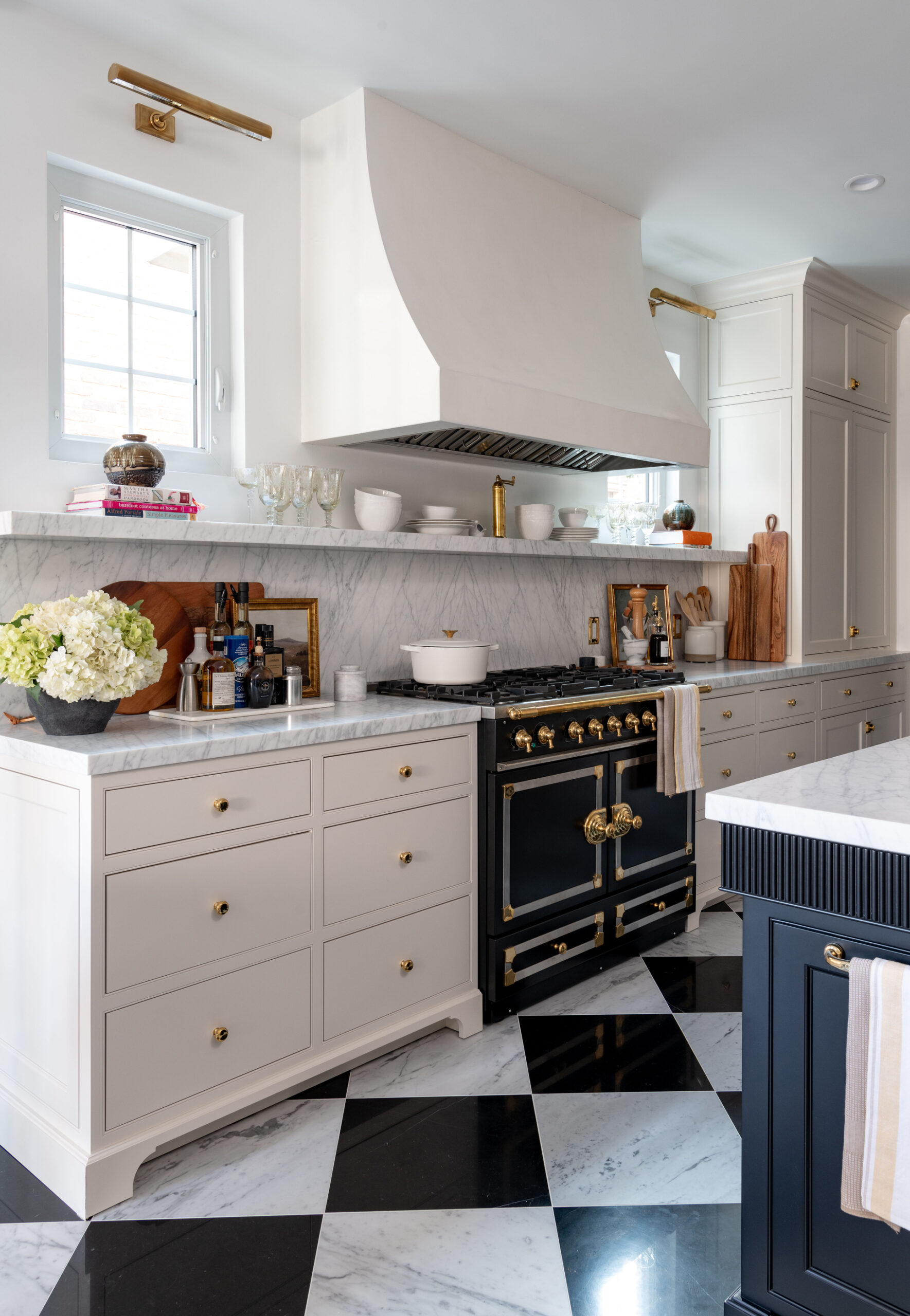 Elegant Kitchen With Dark Blue Island