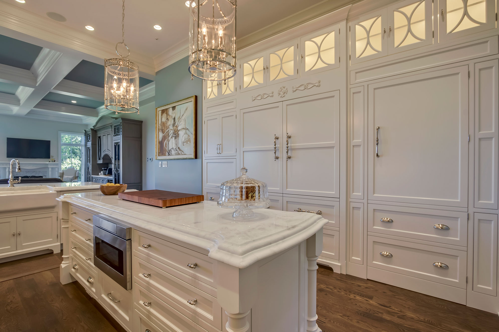 Formal White Kitchen with Custom Clock Hood
