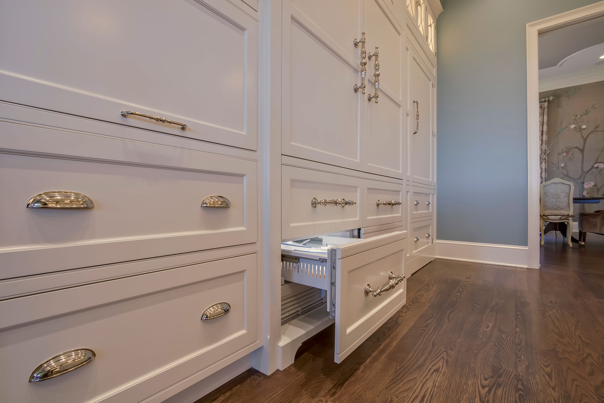 Formal White Kitchen with Custom Clock Hood