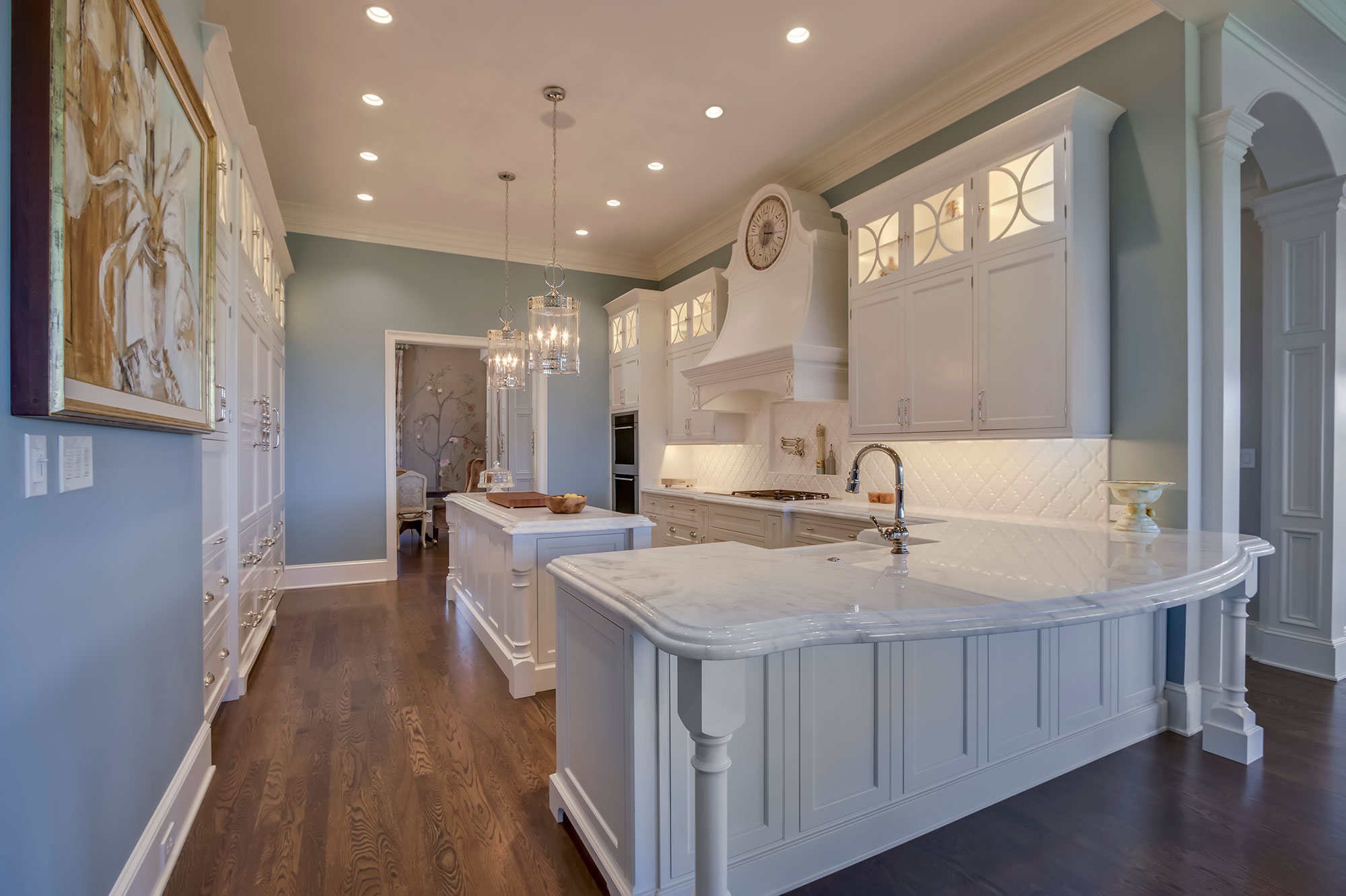 Formal White Kitchen with Custom Clock Hood