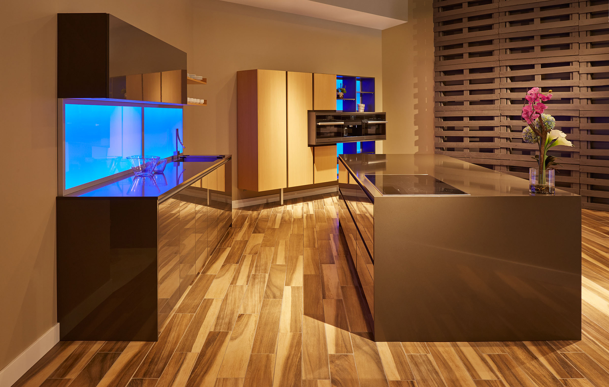 Grey Gloss Cabinetry with a Waterfall Island