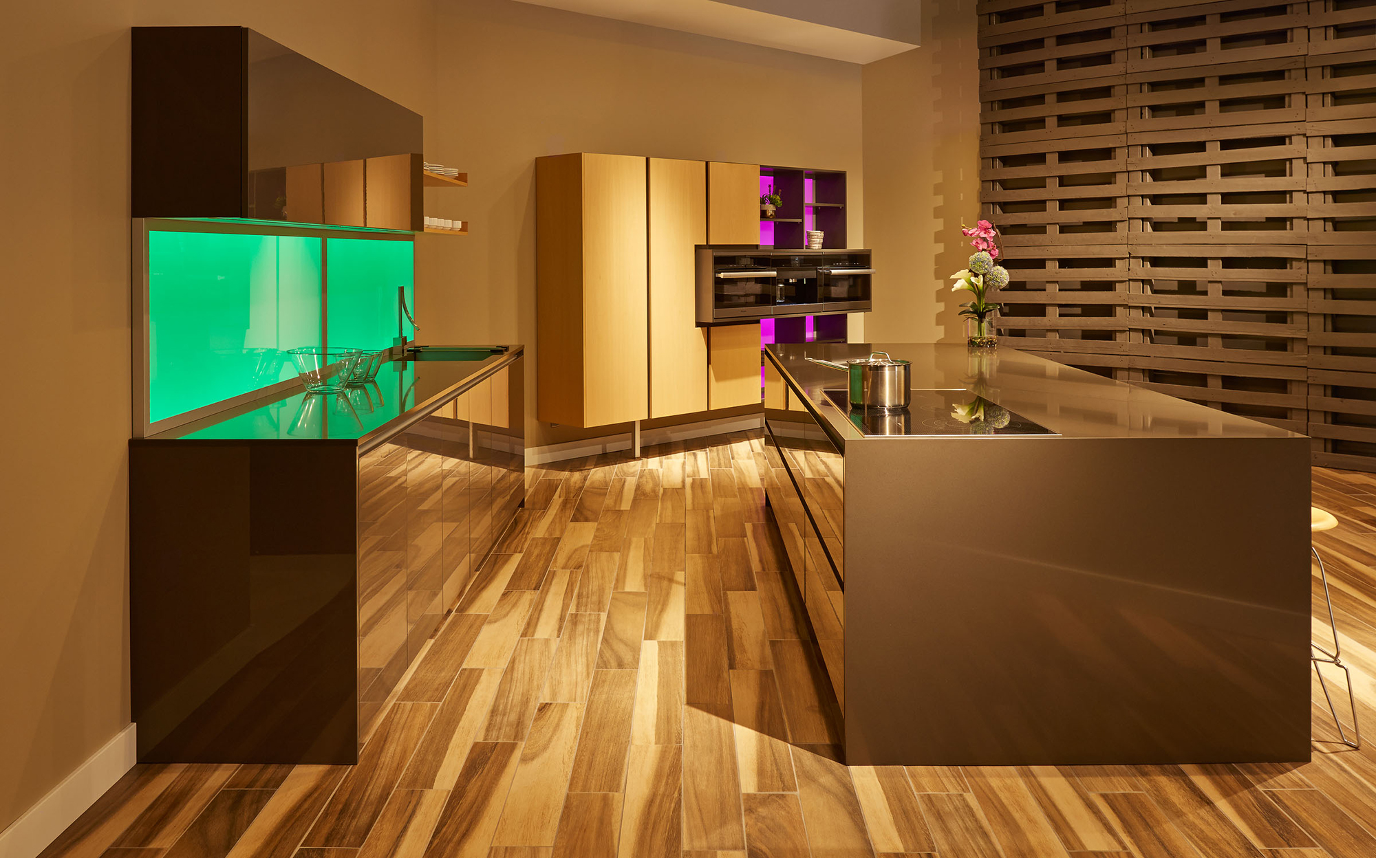 Grey Gloss Cabinetry with a Waterfall Island