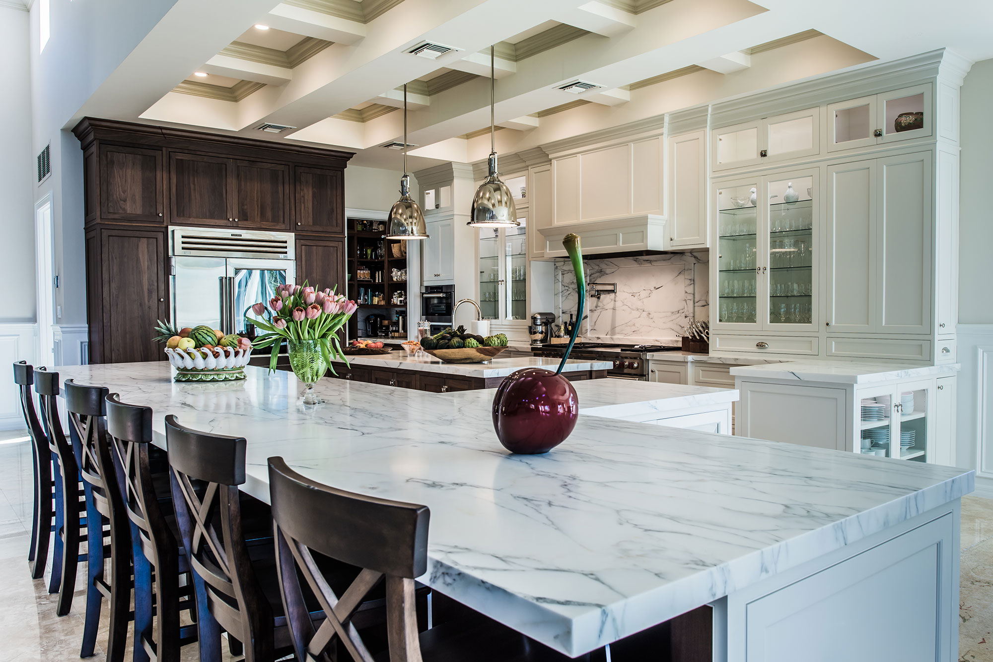 Large White Kitchen with Two Islands