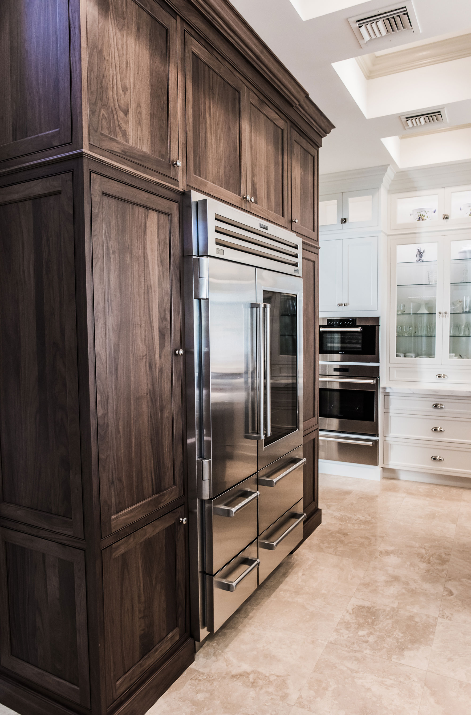 Large White Kitchen with Two Islands