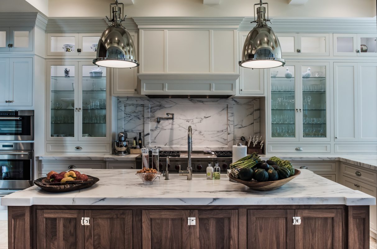 Large White Kitchen With Two Islands