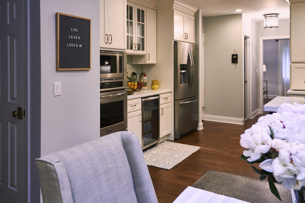 Off White Cabinets with Woodland Brown Island