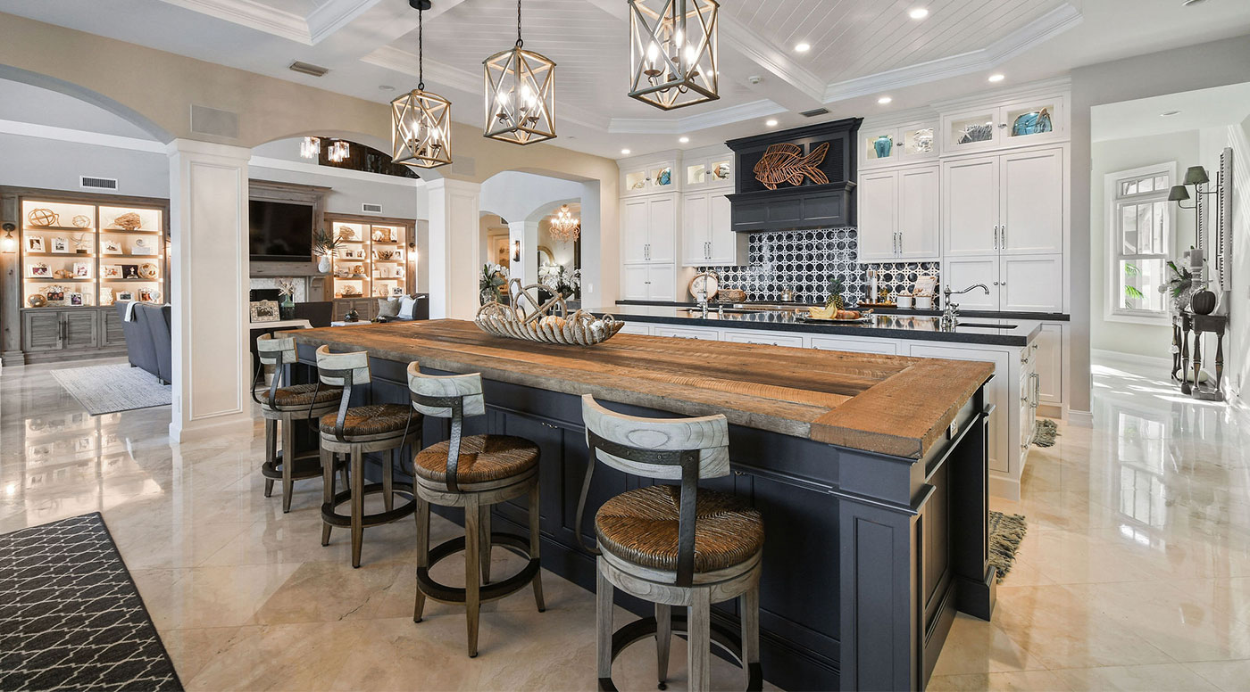 White Kitchen with Rustic Dark Blue Island