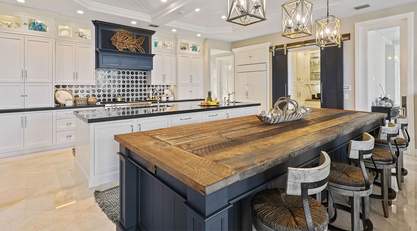 White Kitchen with Rustic Dark Blue Island
