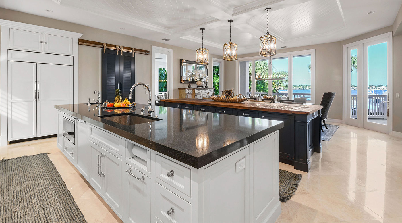 White Kitchen with Rustic Dark Blue Island