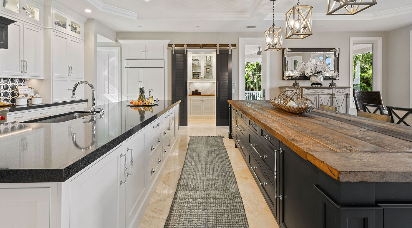 White Kitchen with Rustic Dark Blue Island