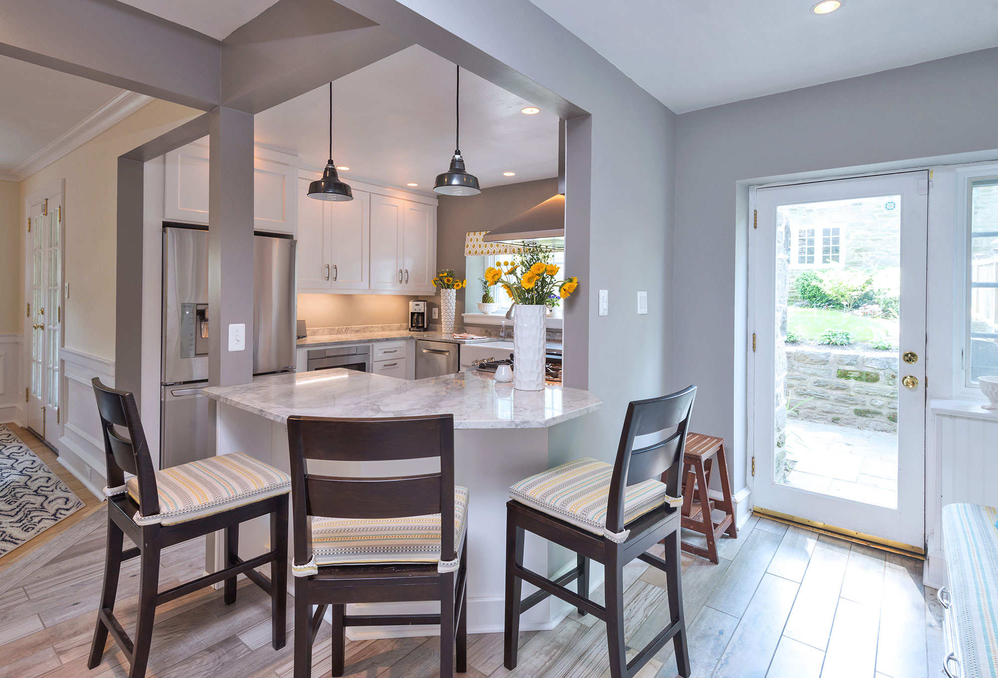 Small White Kitchen with Entry Bench