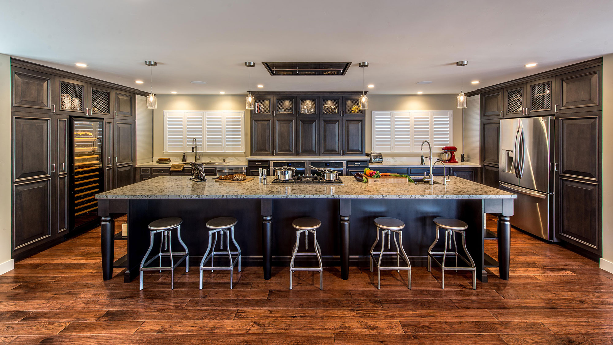 Transitional Kitchen with Dark Stained Alder and Large Island
