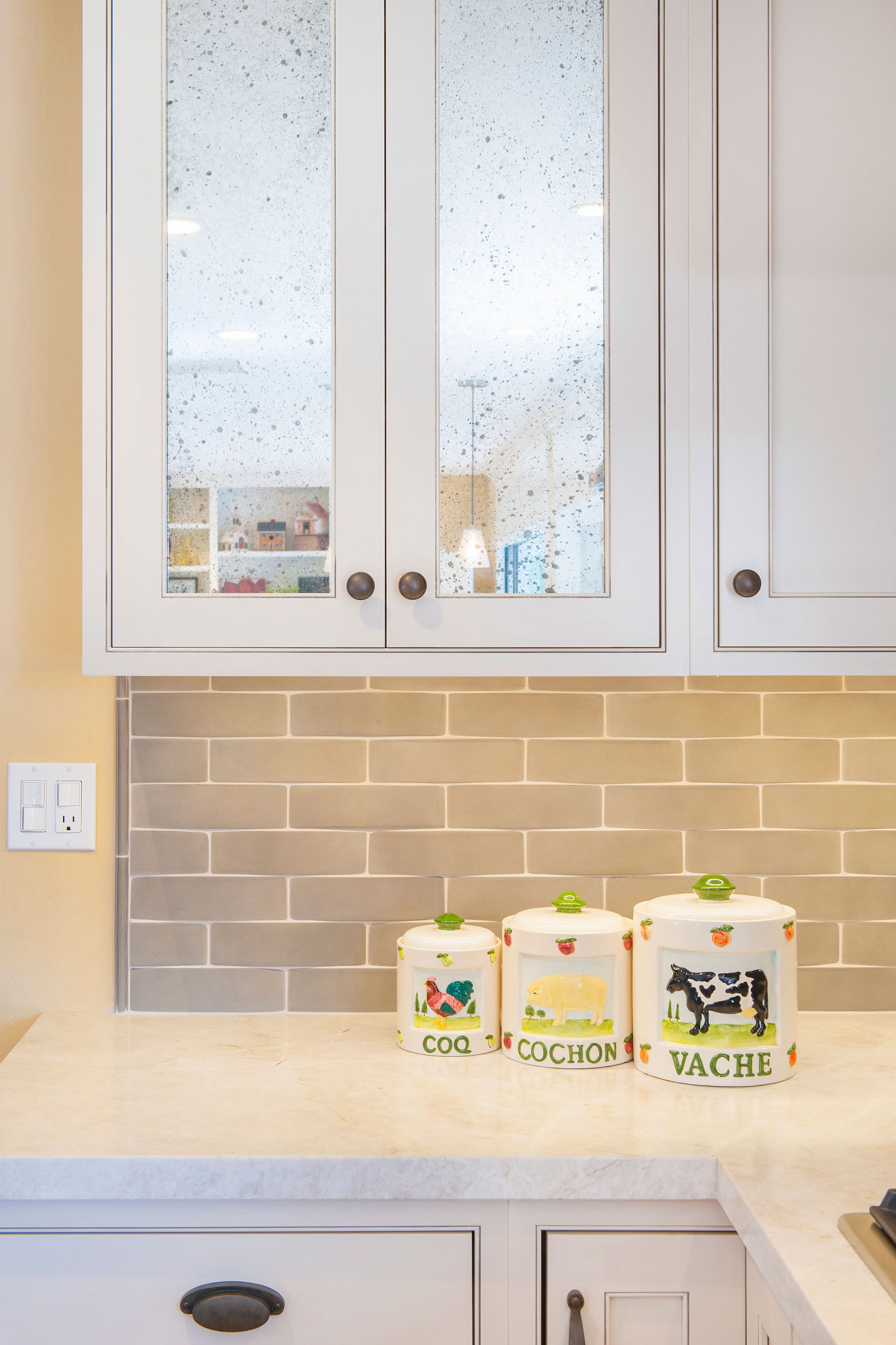 Transitonal Painted White Kitchen with Grey Stained Peninsila
