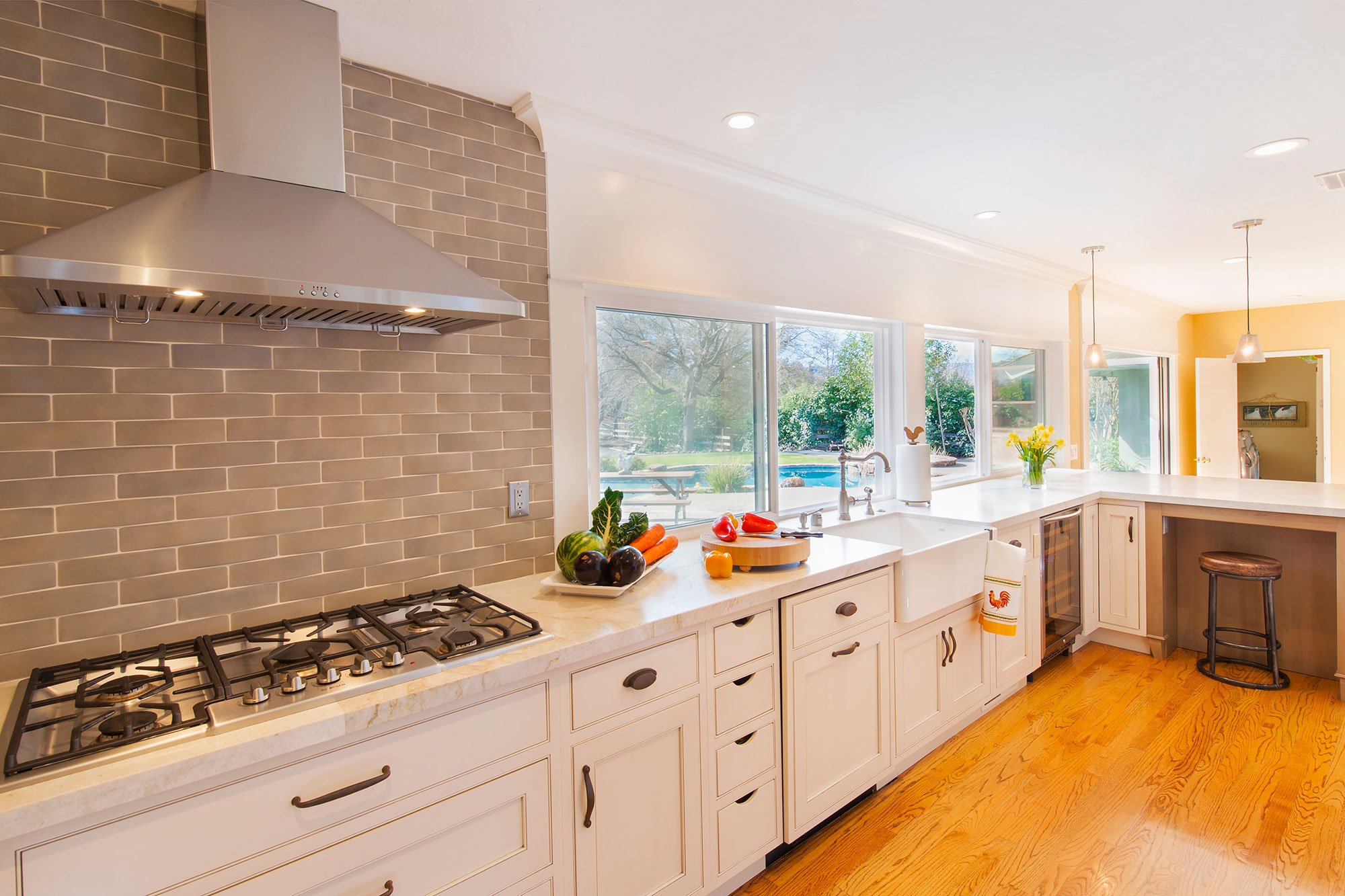Transitonal Painted White Kitchen with Grey Stained Peninsila