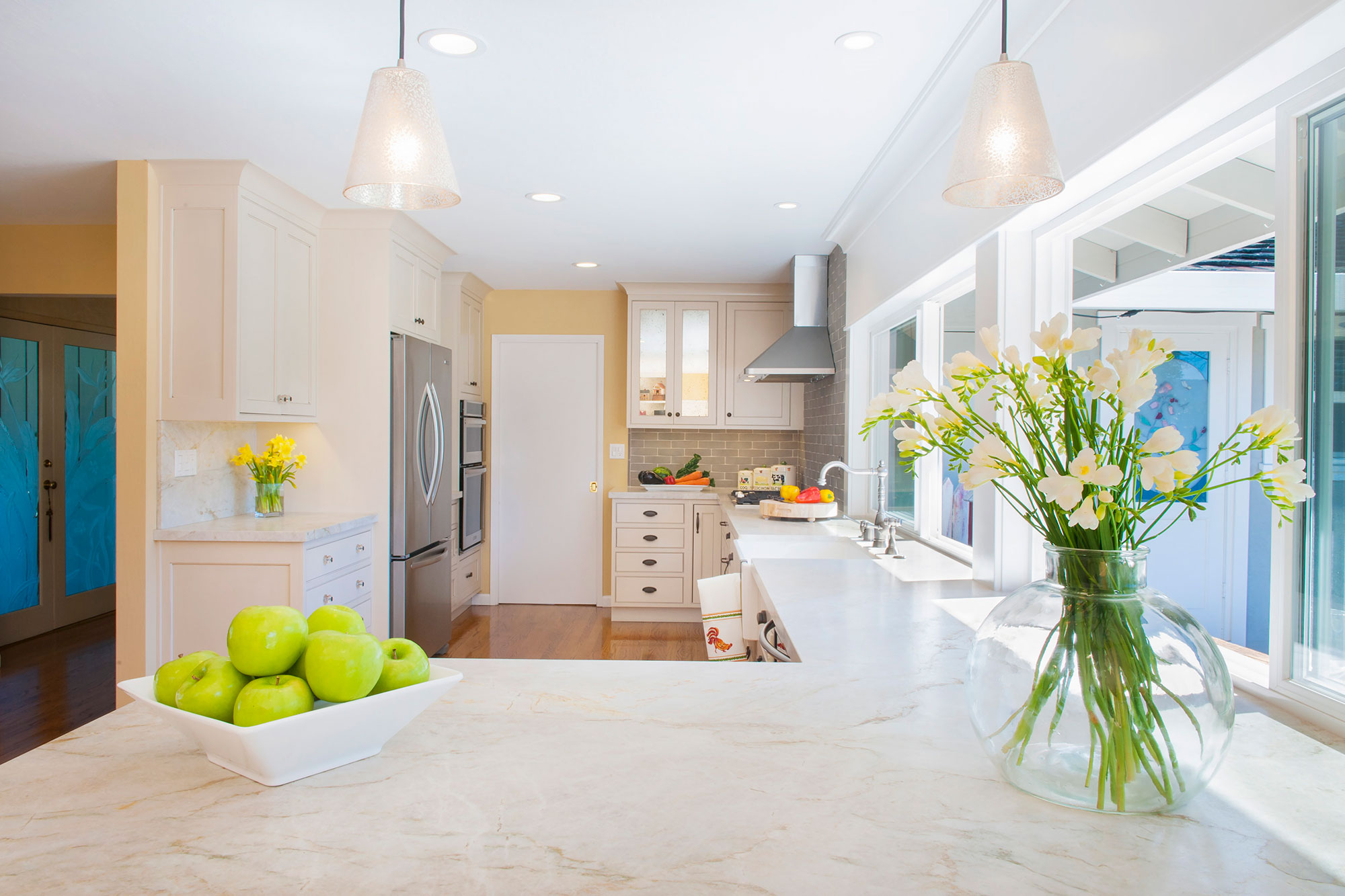 Transitonal Painted White Kitchen with Grey Stained Peninsila
