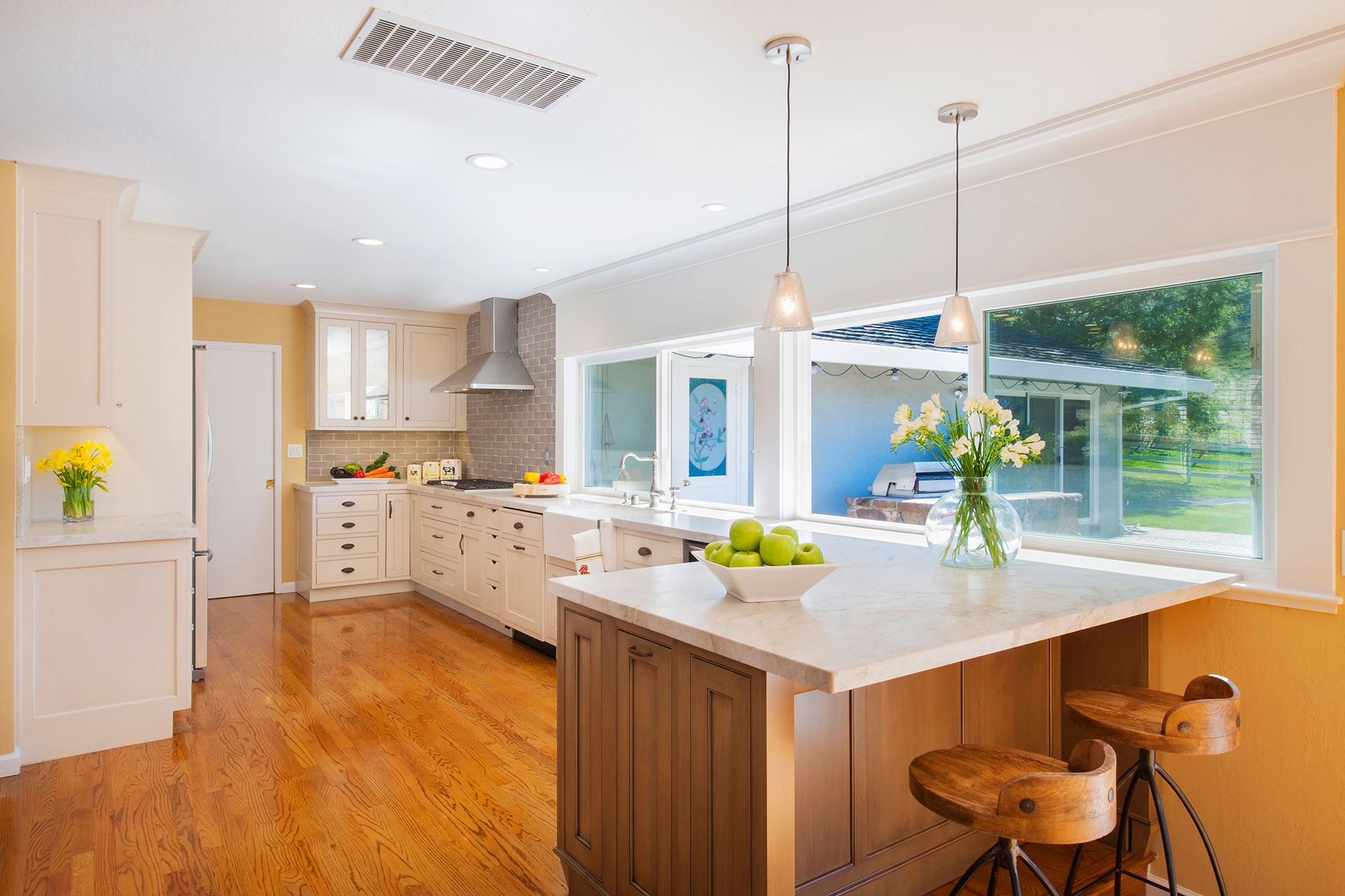 Transitonal Painted White Kitchen with Grey Stained Peninsila