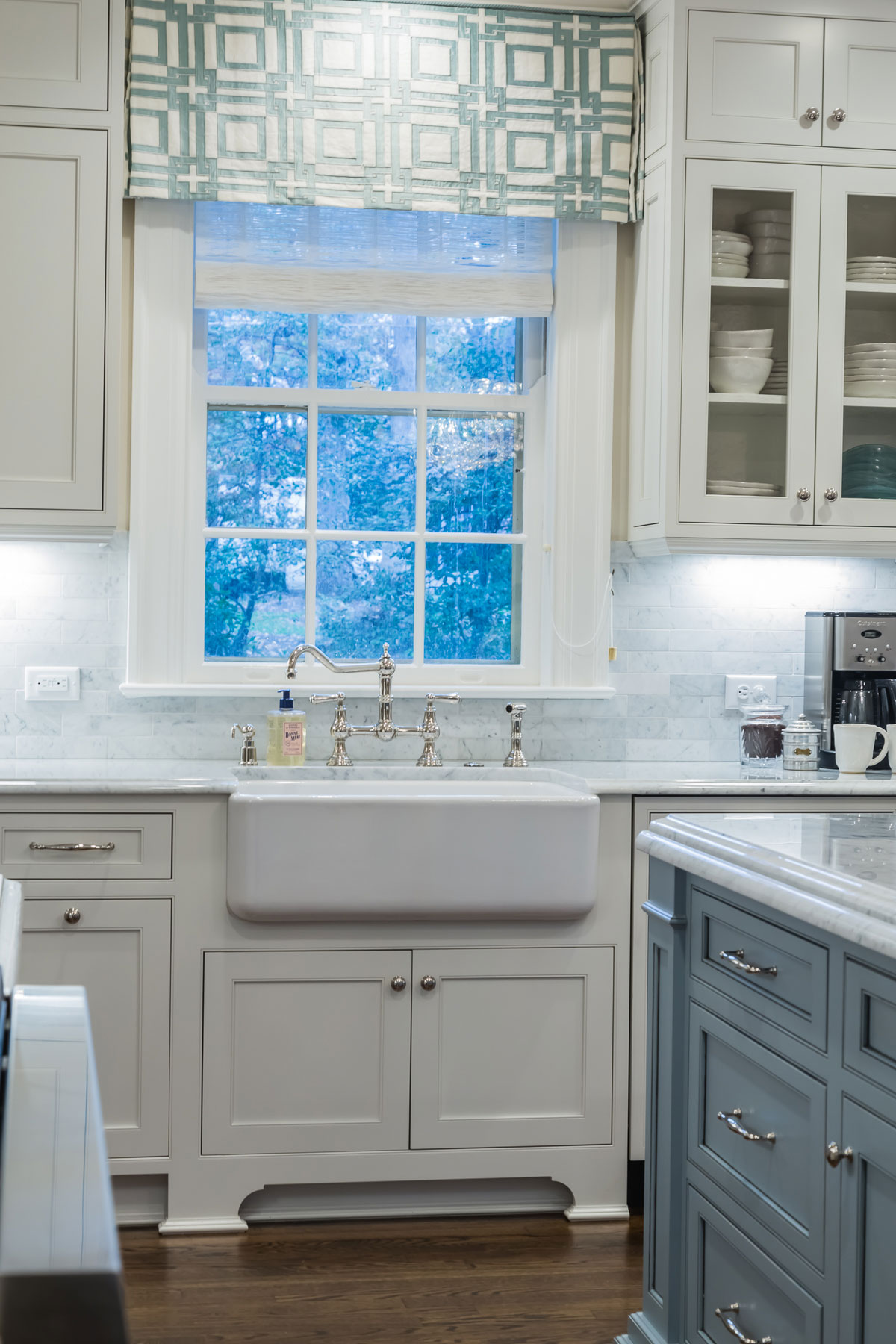 White Kitchen with Light Blue Painted Island