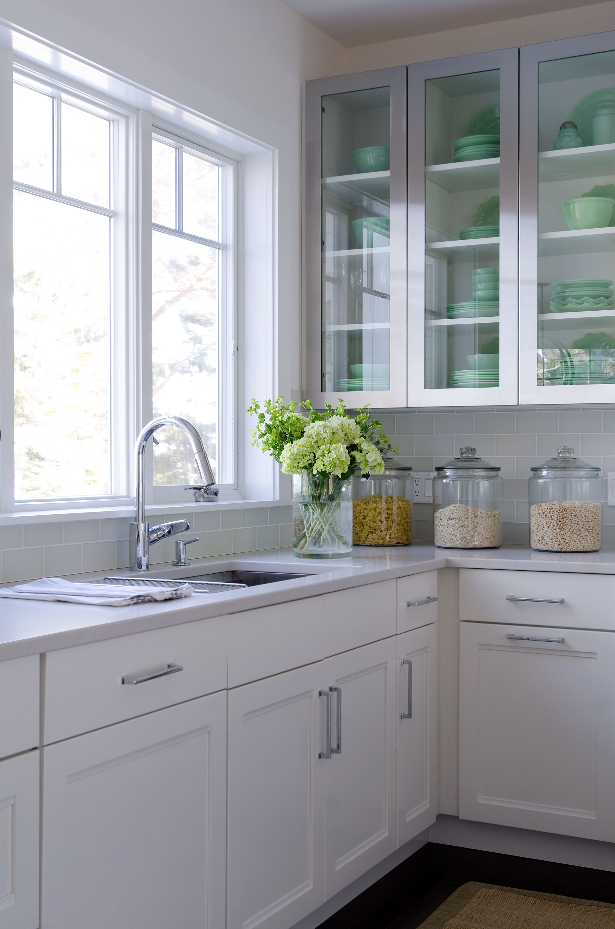 White Kitchen with Metal Accent Doors