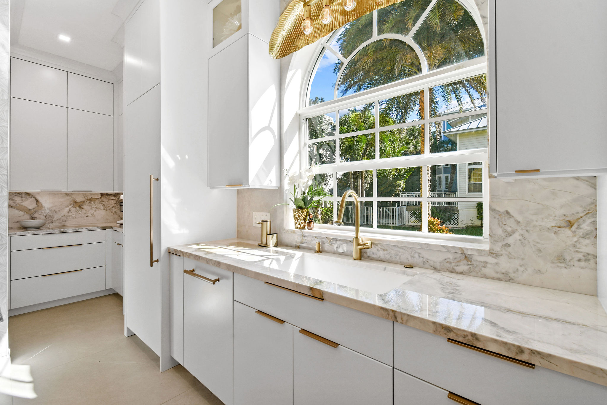 White Painted Kitchen With Custom Island