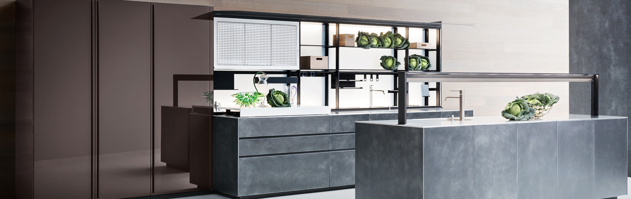 Cabinetry, surfaces, lighting, and furniture in one direction